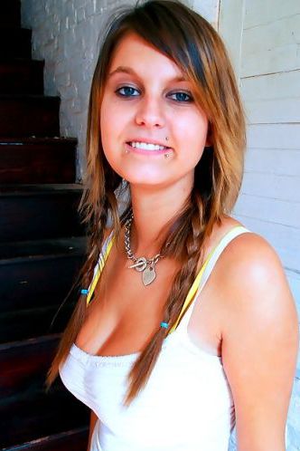 Teen presenting big naturals